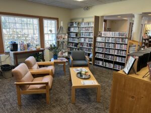 Interior of lounge at Hope Library with chairs and books